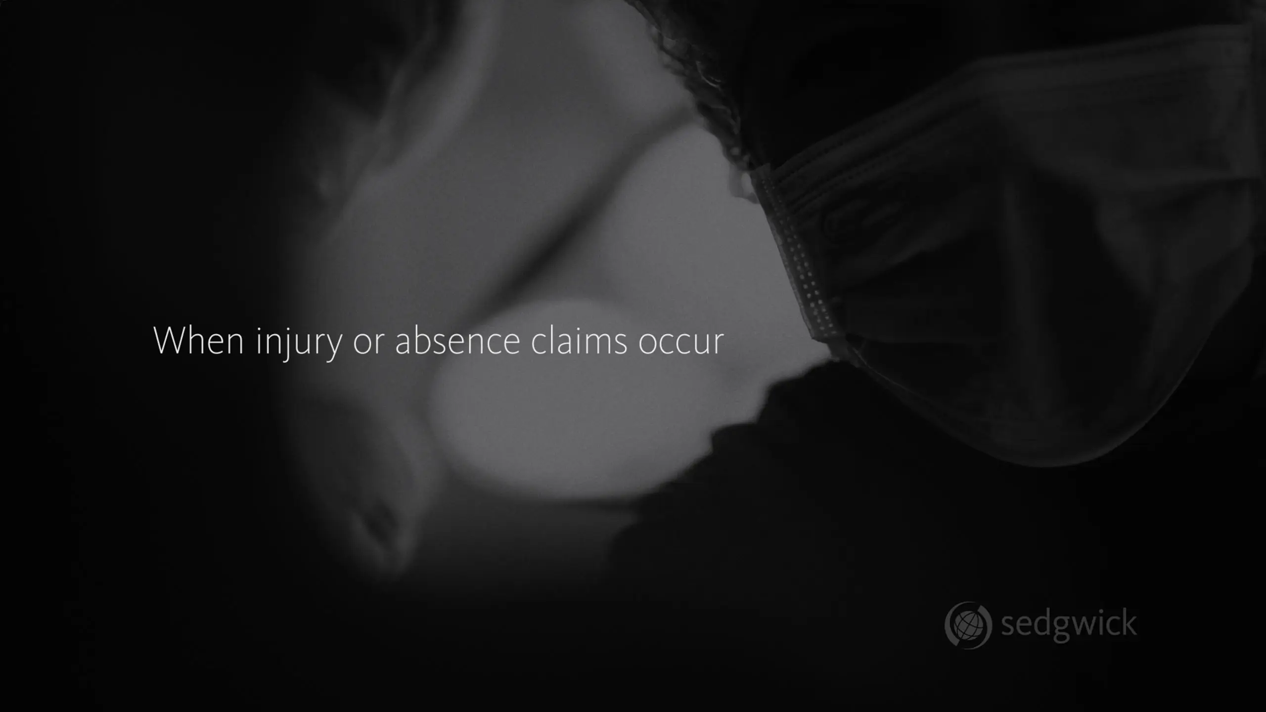 Two individuals wearing surgical masks in a dimly lit setting. Text reads, "When injury or absence claims occur," conveying a serious tone. Sedgwick logo in corner.